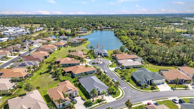 aerial view with a residential view and a water view