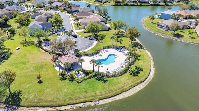 bird's eye view featuring a water view and a residential view