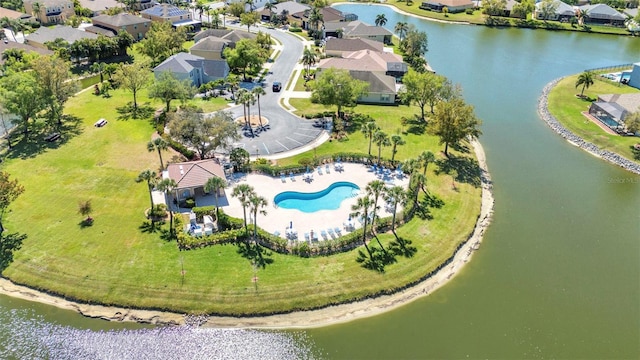 bird's eye view with a residential view and a water view