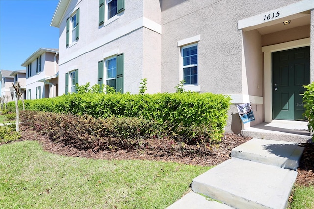 exterior space with stucco siding