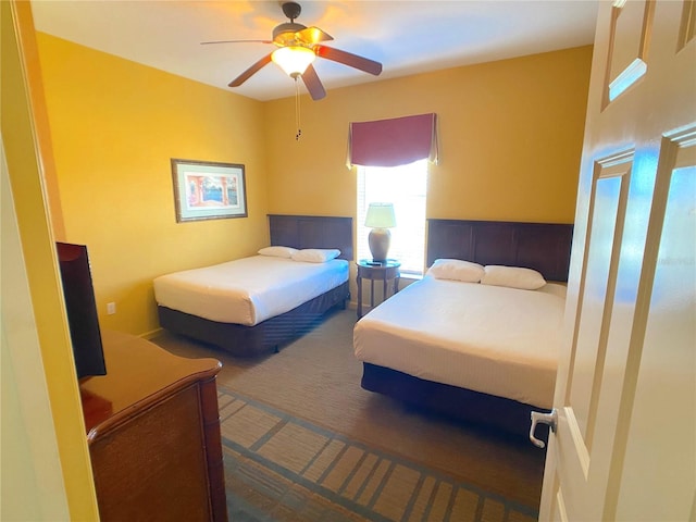 bedroom featuring carpet floors and ceiling fan