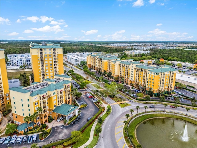 birds eye view of property with a view of city