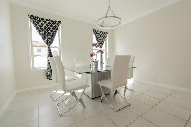 dining area with baseboards, light tile patterned flooring, and crown molding