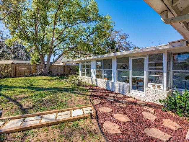 view of yard featuring a fenced backyard