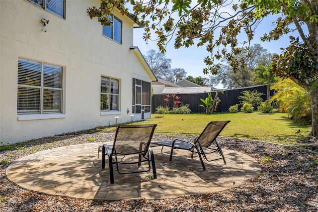 view of yard with a patio area and fence