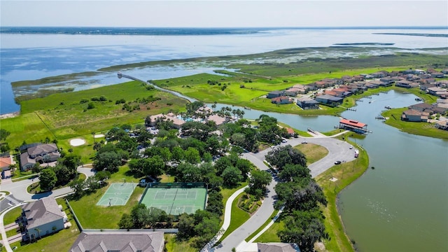 bird's eye view with a water view and a residential view