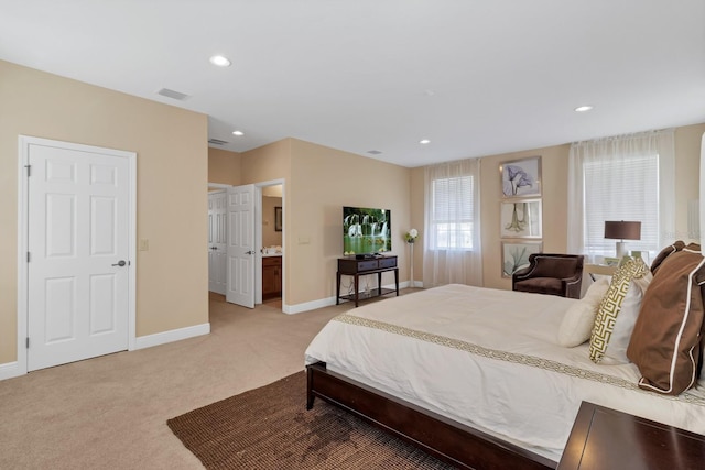 bedroom featuring recessed lighting, visible vents, light carpet, and baseboards