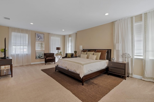 bedroom with baseboards, visible vents, carpet flooring, and recessed lighting