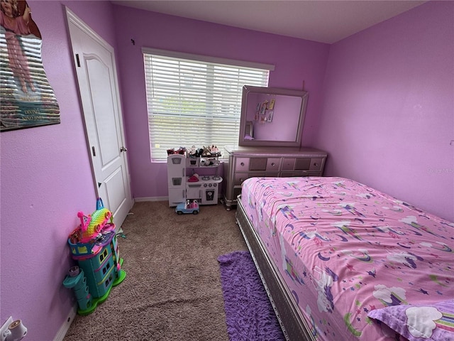 3082 Royal Tern Dr, Winter Haven, FL 33881 - bedroom with carpet and baseboards
