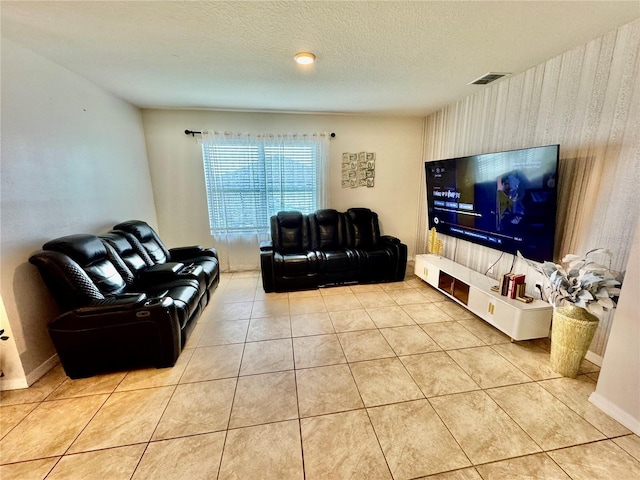 3082 Royal Tern Dr, Winter Haven, FL 33881 - tiled living area featuring a textured ceiling and wallpapered walls