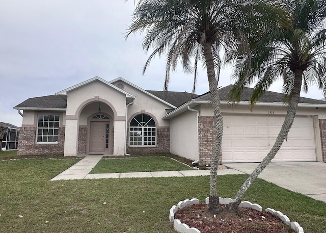 single story home with a garage, driveway, stucco siding, a front yard, and brick siding