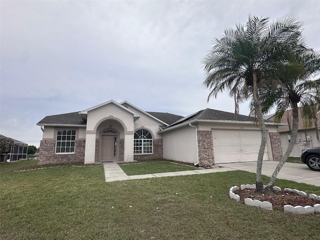 single story home featuring driveway, a garage, brick siding, a front lawn, and stucco siding