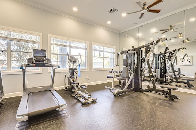 workout area featuring baseboards, visible vents, ornamental molding, and recessed lighting