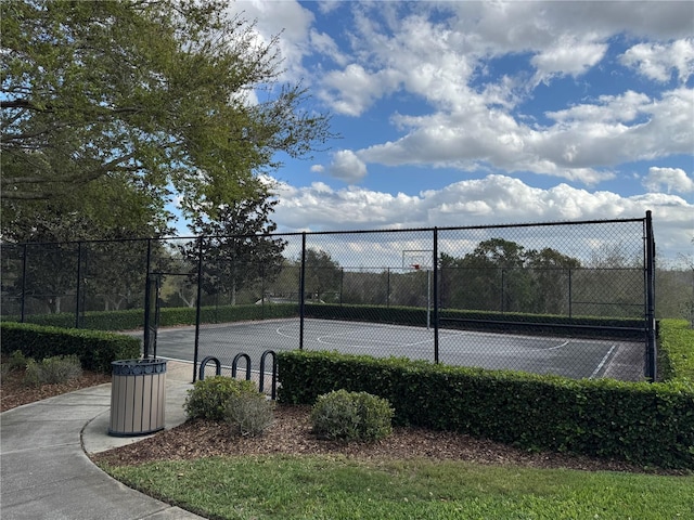 view of sport court with community basketball court and fence