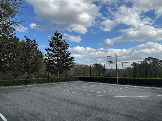 view of sport court with community basketball court and fence