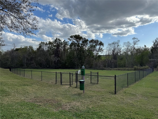 view of yard with a gate and fence