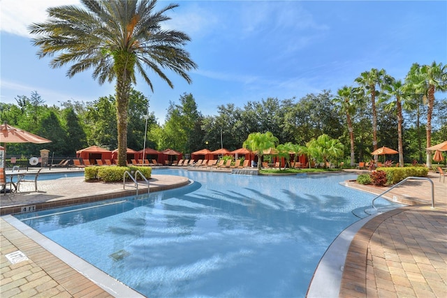 community pool featuring a patio area