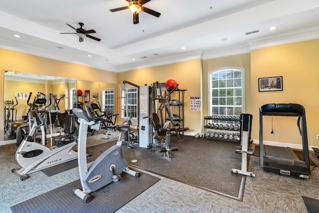 workout area featuring baseboards, visible vents, ornamental molding, and recessed lighting