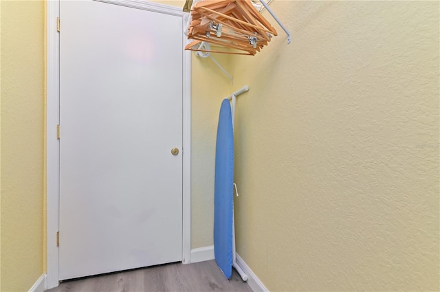 spacious closet with wood finished floors