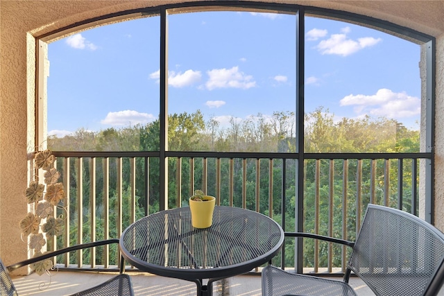 sunroom with plenty of natural light