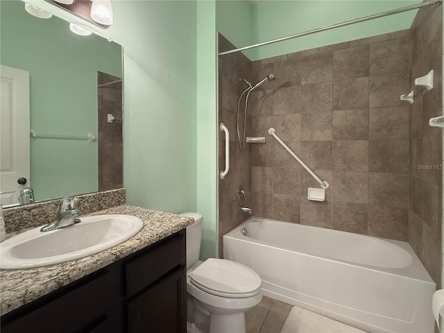 full bathroom with tub / shower combination, vanity, toilet, and tile patterned floors