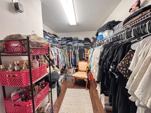 spacious closet with wood finished floors