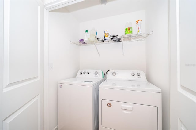 laundry room with washing machine and dryer and laundry area