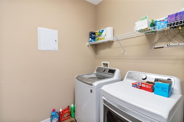 washroom with laundry area and washing machine and clothes dryer