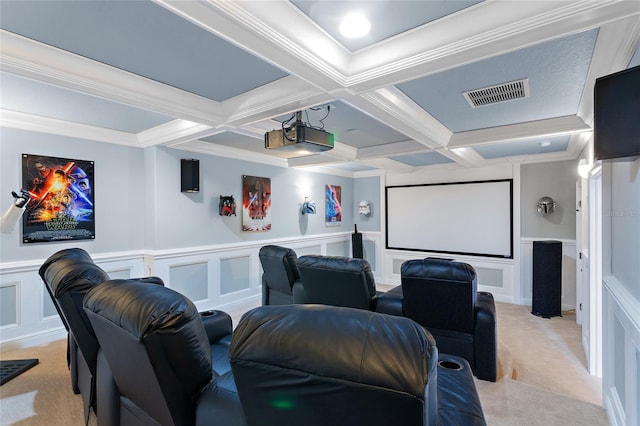 cinema with a decorative wall, light colored carpet, coffered ceiling, visible vents, and beam ceiling