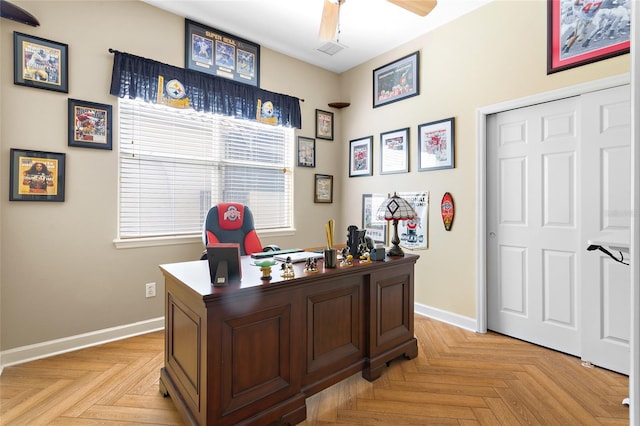 office with ceiling fan, visible vents, and baseboards