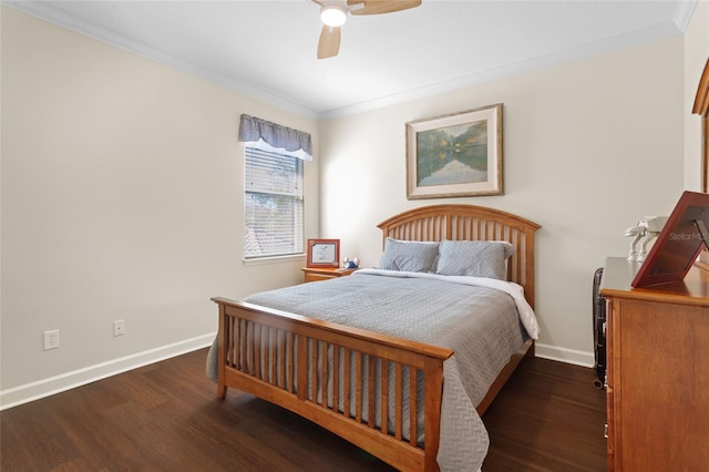 bedroom with baseboards, ornamental molding, and wood finished floors