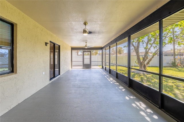 2931 Chilton St, Deltona, FL 32738 - unfurnished sunroom with a ceiling fan