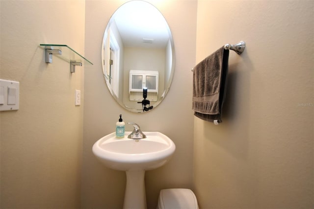 bathroom featuring toilet