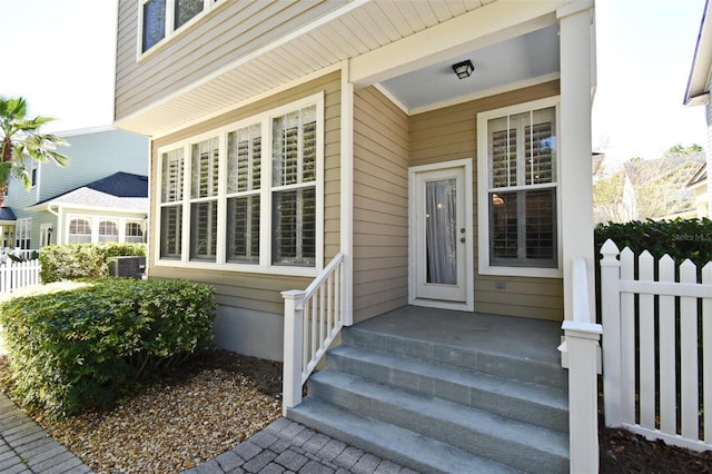 property entrance with fence