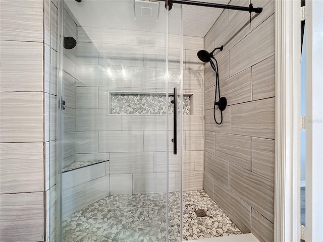 bathroom featuring a stall shower