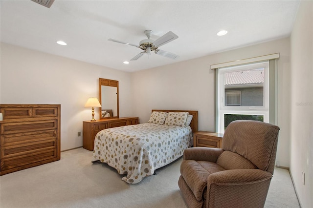 bedroom featuring ceiling fan, baseboards, light colored carpet, and recessed lighting