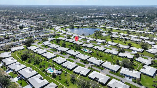 aerial view featuring a residential view and a water view