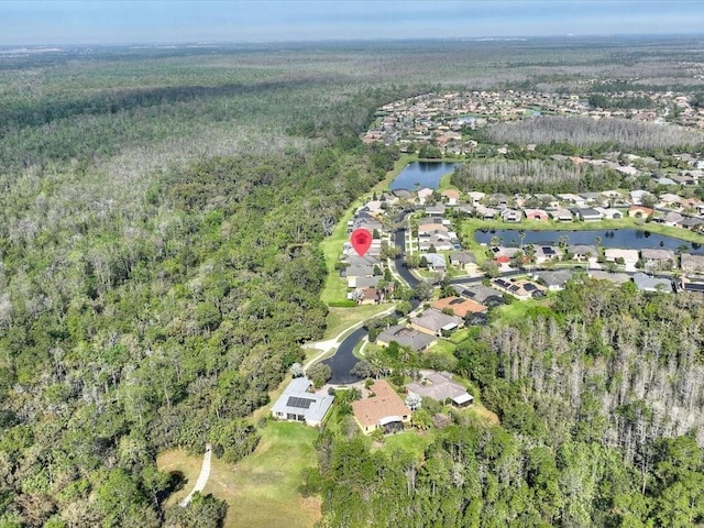 bird's eye view with a residential view, a forest view, and a water view