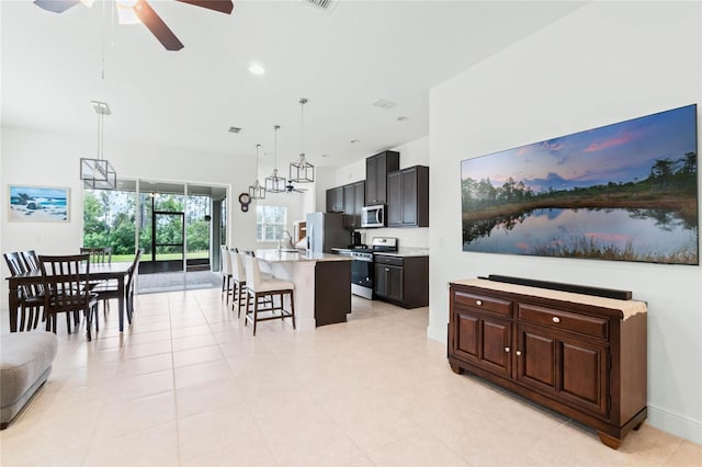 dining area featuring visible vents, recessed lighting, baseboards, and ceiling fan