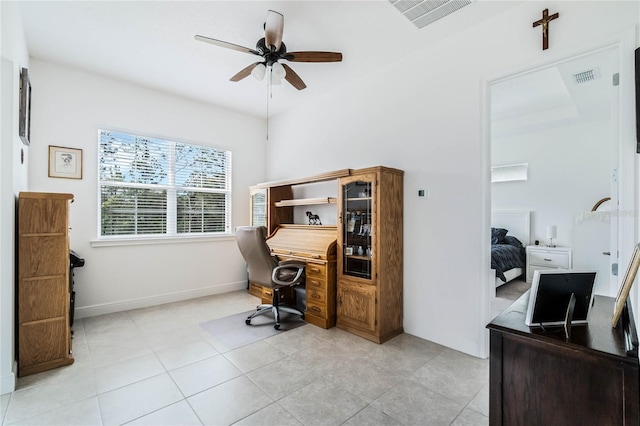 home office featuring visible vents, baseboards, and ceiling fan