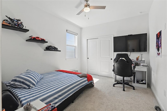 7793 Clove Hitch Way, Orlando, FL 32832 - bedroom with ceiling fan, a closet, carpet flooring, and baseboards