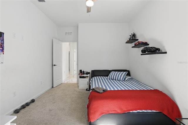 7793 Clove Hitch Way, Orlando, FL 32832 - bedroom featuring light carpet, a ceiling fan, visible vents, and baseboards