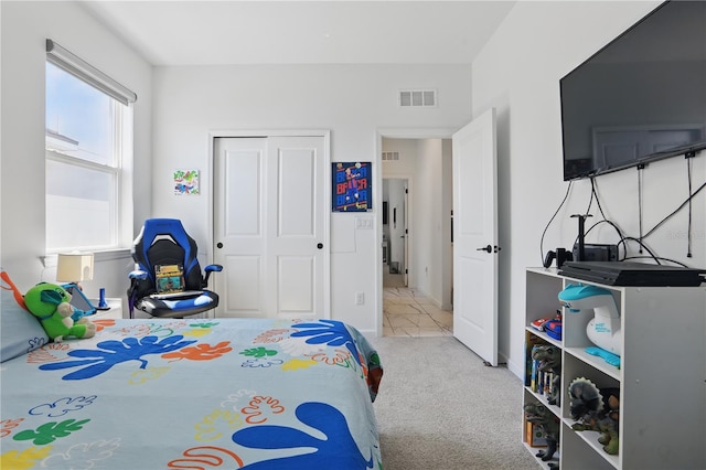 7793 Clove Hitch Way, Orlando, FL 32832 - carpeted bedroom featuring visible vents and a closet