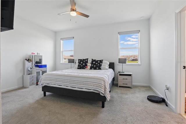 7793 Clove Hitch Way, Orlando, FL 32832 - bedroom with baseboards, multiple windows, and carpet flooring