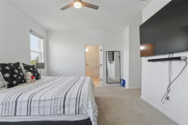 7793 Clove Hitch Way, Orlando, FL 32832 - carpeted bedroom with baseboards, a ceiling fan, and ensuite bathroom