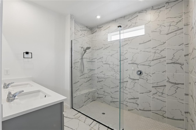 7793 Clove Hitch Way, Orlando, FL 32832 - bathroom featuring marble finish floor, a marble finish shower, and a sink