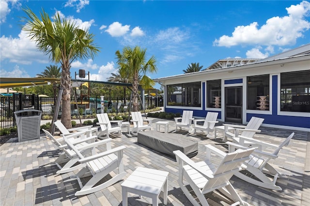 7793 Clove Hitch Way, Orlando, FL 32832 - view of patio with fence and a sunroom