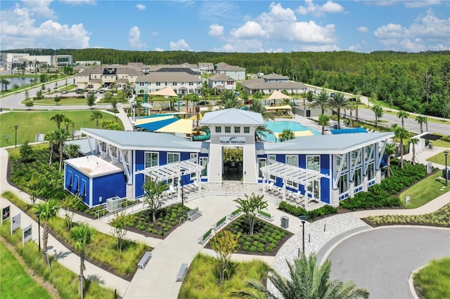7793 Clove Hitch Way, Orlando, FL 32832 - drone / aerial view with a forest view