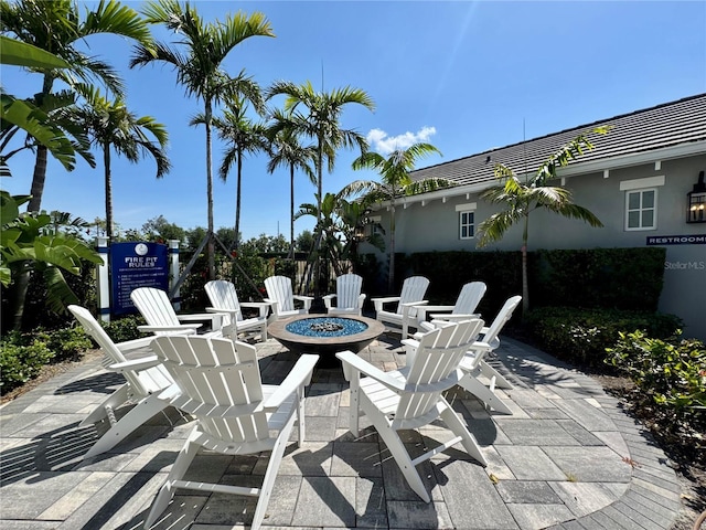 14552 Skipping Stone Loop, Parrish, FL 34219 - view of patio / terrace featuring a fire pit