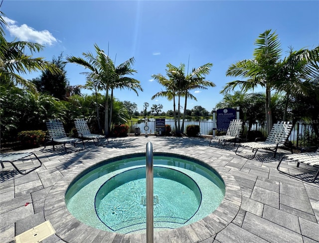 14552 Skipping Stone Loop, Parrish, FL 34219 - view of pool with fence, a patio, and a hot tub
